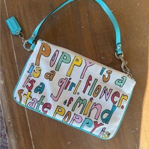 Coach Poppy Love Wristlet
Women's Rare with Teal Strap